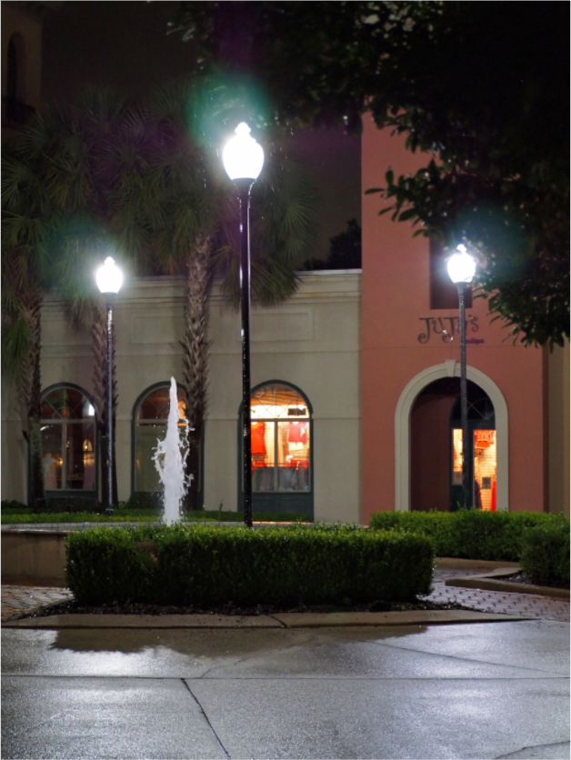 Main image Plaza with fountain and store